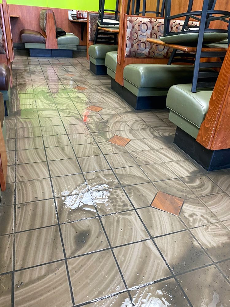 Tile floor before specialty deep cleaning