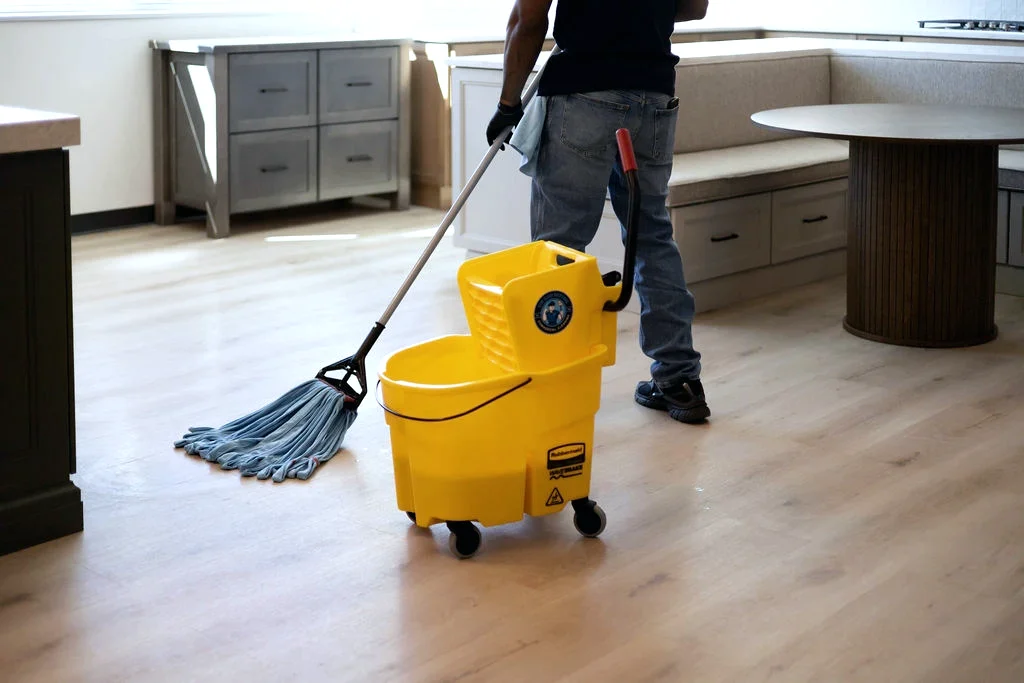 Mop and bucket in use on a commercial hard floor