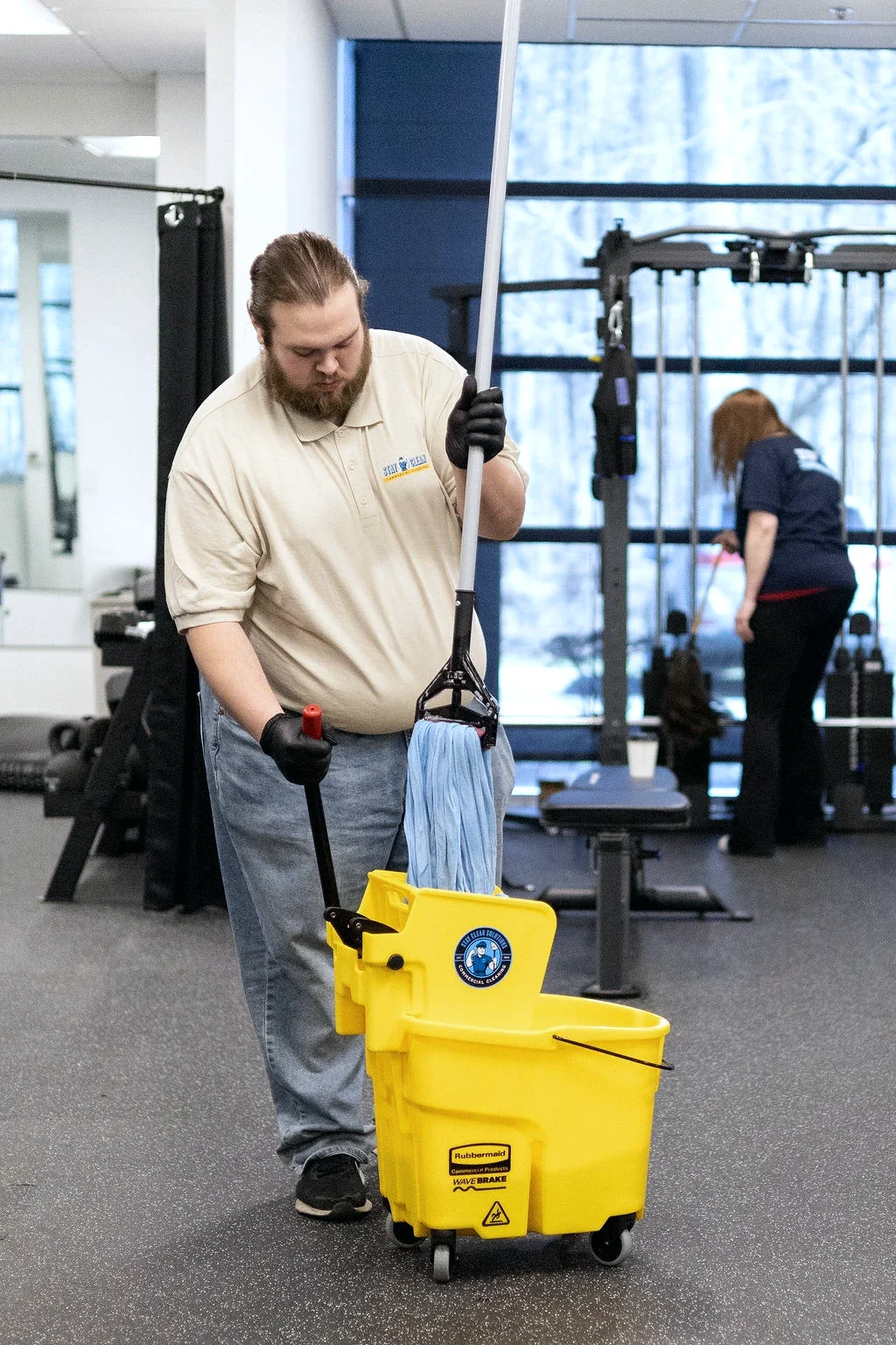 Stay Clean crew servicing a commercial fitness facility